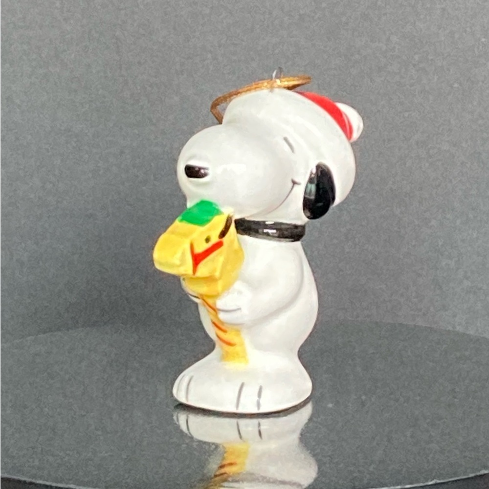 United Feature Syndicate Santa Snoopy Holding a Hobby Horse Ornament 1966
